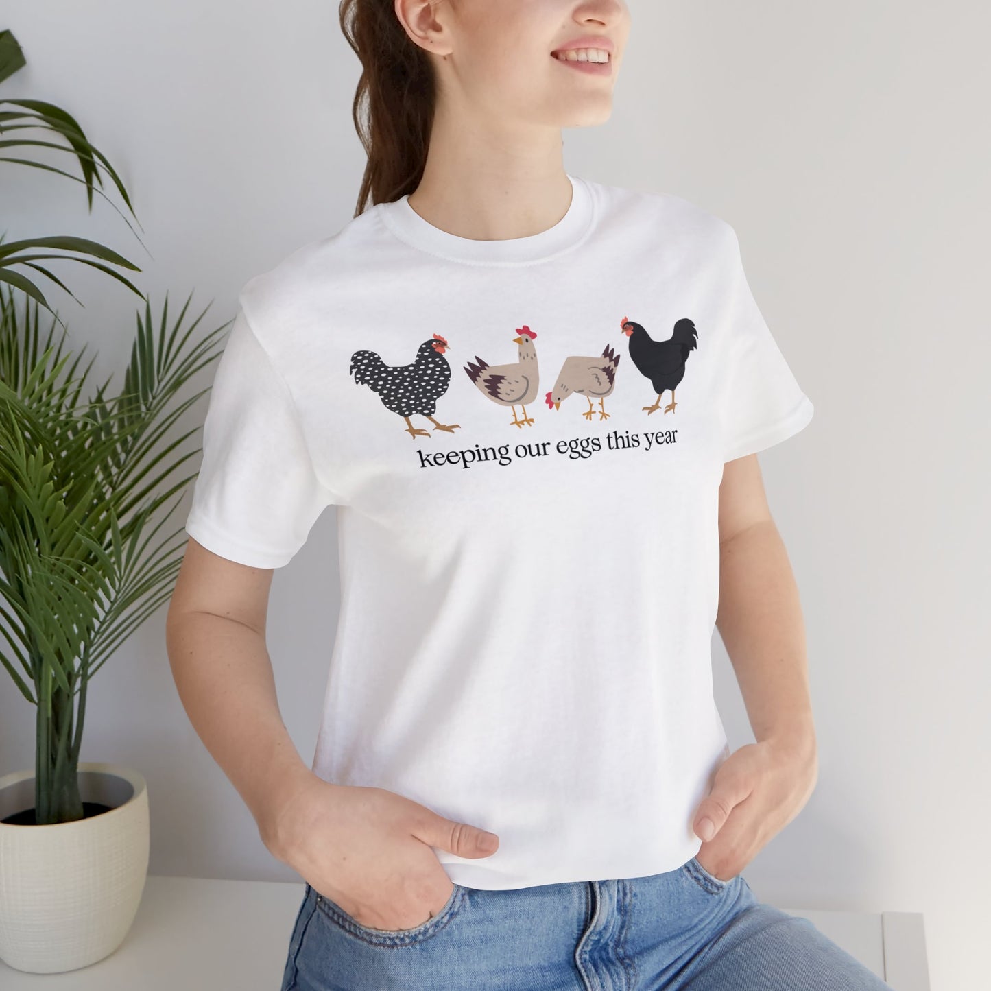 "Keeping Our Eggs This Year" T-Shirt | Humorous Womens Easter Tee Shirt | Funny Easter Tee Shirt for Her | Gift Ideas for Women | Easter Apparel for Ladies | Ladies Easter Tee Shirt