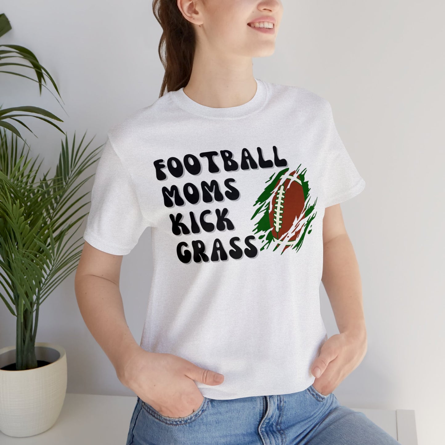 "Football Moms Kick Grass" T-Shirt | Funny Football Mom Shirt | Perfect Gift for Sports Moms | Football Mom Apparel | Football Mama Tee | Mother's Day Gift Ideas | Football Shirt for Game Day | Cute Football Mom Tee